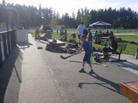 20140501 171350  Ben practicing slap shots and scoop shots while Sam is in the rink. Ben is too young to play this year, but the coaches were talking him into it for next year :)