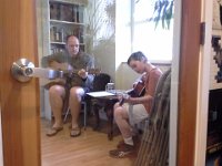 20140501 191759  At guitar/uke practice afterwards - we literally had 9 minutes to choke down PB&J sandwiches after hockey then scoot to Randy's. Fortunately, Sam and Ben were really pumped up after playing hockey, so they were focused despite being tired and hot. This is Sam continuing to practice a classical piece even after his lesson was over. I'm in the room with Ben who is taking his turn with Randy. Dave got home in time to have some dinner then meet us down at the lesson.