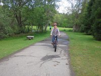 20140505 165121  Ben likes to ride his bike while Sam skates.