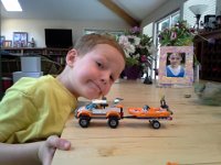 20140517 162404  Ben and the latest build - a neat truck and little boat!