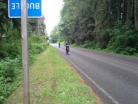 20140523 164318  Sam biking down our road with a friend :)
