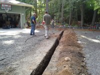 20140526 161803  Digging massive trenches to put in power and water hookups for the RV!
