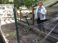 20140526 161829  Mom doing a lot of planting to get veggies in the ground :)