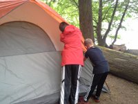 20140627 103633  Helping break down camp - it was raining on our final morning.