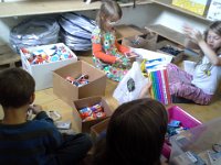 20140820 103244  This was my crew - we worked on bundling up glue sticks into groups of 4. We also sorted pens, pencils and other supplies.