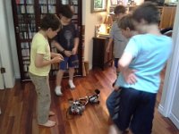 20140819 180509  Battle Bots at our house! Sam and Alex have built robots to battle each other. Sam is sharing the controller with a friend right now so he can battle Alex's robot. The boys loved it! They would build, battle, then retool.