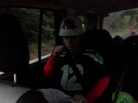 20141107 164014  Riding down to hockey practice. He earned the hard hat award at the previous game. He really loved wearing it to practice, although he is very humble and nearly foiled my attempt to take a picture.