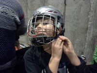20141120 170419  Sent a few pictures to parents who were still at work. This guy needed a helmet - I found one in our truck that his dad had given us to save for Ben. This boy saw it and was like "Oh! My favorite helmet!" Funny!