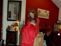 2014-12-24Christmas (14)  Wrestling a big present out for mommy...what could it be?