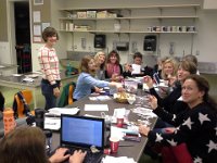 20141210 100715  The PTO ladies clipping box tops to send in for $0.10 each to raise money for school. The lady standing up was in German Club with me last year. She's really a go-getter and has taken our rather dormant alternative fundraising effort to a new level. Thanks, Nicole!