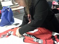 20151107 151345  And sewing name plates on to the jerseys - thank you, Lisa!
