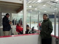 20151107 154823  Dave helping with score sheet and clock training, Dan in the penalty box. Every home game has at least 4 volunteer jobs to fill, not to mention helping in the locker room to keep a lid on things!