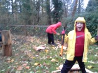 20151123 153813  Doing some more wood chopping for my friend Sara. We made it through her whole pile in the rain, and made kindling, too. The boys were a big help.