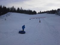 20151222 152121  This is the tubing run - we had 8 boys over there at the end of the day whooping as they flew down the hill, then dragged the tubes back up. Unfortunately, by this time, the two teens (Kai and Silvio) had been injured on downhill runs and were on their way to Omak for x-rays in the little hospital across the pass.