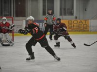 2015-11-27SamHockeyByRMT (1)  I think these are pictures from the Thanksgiving tournament, thanks to Richard taking a bunch with his awesome camera! There are some cute ones of mom at the end. We got POUNDED by the Canadian PeeWee teams! Not only are they better players, they're older than us.