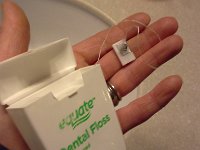20160122 201710  I'm very frugal. This broke off months ago and it's a pain to use, but there's still floss in there. I haven't bought a new one. I betcha anything my mom will read this and ship me a new floss container saying "WHAT THE HECK ARE YOU DOING WITH YOUR PRECIOUS SCARCE TIME MESSING WITH THAT?!" ;)