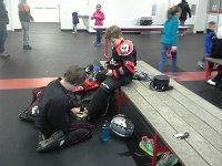 20160124 134534  Sam is tying Ben's skates - isn't that nice? Ben has practice on Sunday, so we stayed after Sam's game straight through stick and puck to Ben's practice. I spend a lot of time at the rink! Dave got us lunch then went home to study.