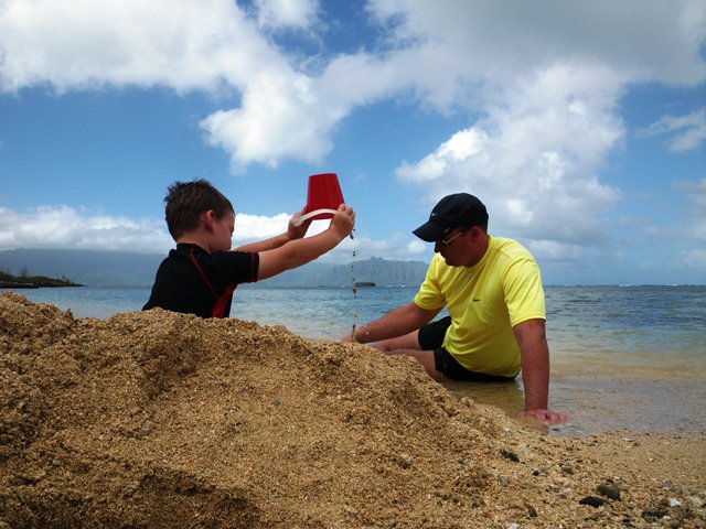 A beach visit this morning - Sam and Dave made a huge volcano. Also getting ready for a space-a trip to CA for Thanksgiving. Bags are about half packed...waiting for a flight.