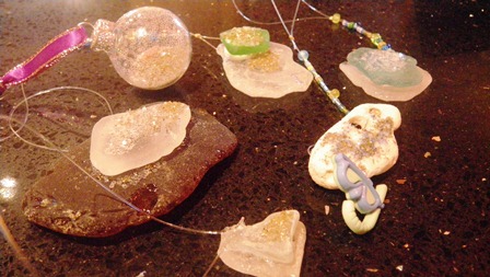 The elves made these ornaments yesterday. We used an epoxy we learned about at the hardware store last night. The helpful guy we spoke to actually makes jewelry!