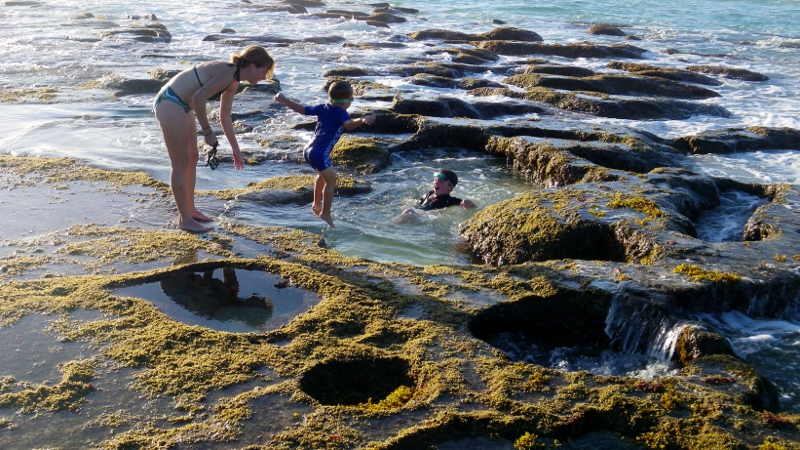 These tide pools emerge in the winter when the sand is relocated by the north swells. It's a tad chillier for swimming, but when you're jumping in and out, working hard, you hardly notice it in the warm afternoon sun. 