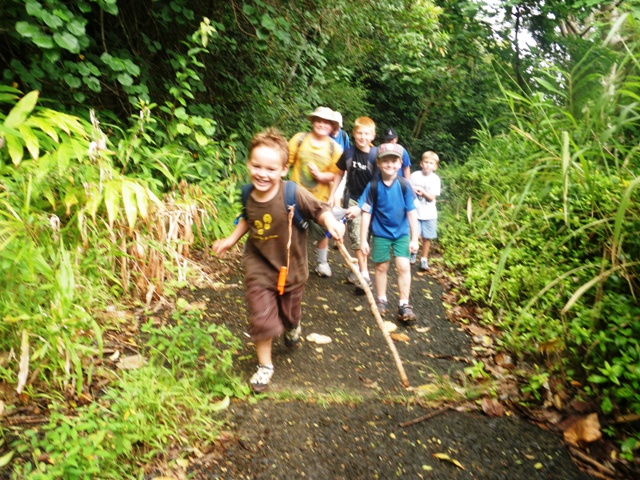 The tribe marching up Old Pali Rd to the Lookout - 8 kids and 3 moms!