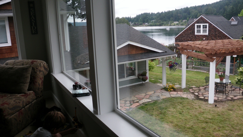 imgp4046-800x451 Here is our guest house view for the next 7 days! We are in Poulsbo - staying at a place in Lemolo on the water. We are so excited to finally be here, but I am definitely struggling with being away from our dear Hawaii friends, stomping grounds, sands, sun, water, mountains. I am also COLD and it's summer here!!! We got in after midnight last night and Ben is still asleep late this morning. He really tired himself out with his shenanigans :) So we pick up the truck today from the port, sign for our new house, and arrange for delivery of our household goods - which will be here in only ONE week. Amazing!!!!