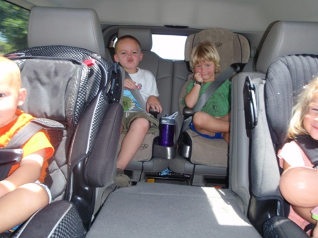 Our kids riding to Kathy's house for playtime.
