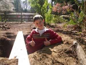 Sam in his mine shaft. He is standing up in there! Also rode along those two boards!