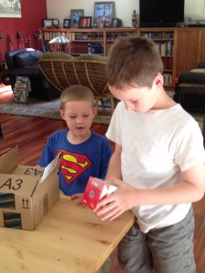 Sam "unboxing" his new 9x9! He was so excited to get it, straight from China.