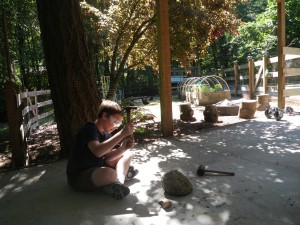 The workshop in the car port, with chickens keeping us company :)