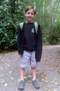 First day of school for Sam in 2011 - first grade. He's wearing an Eddie Aikou surf shirt. 