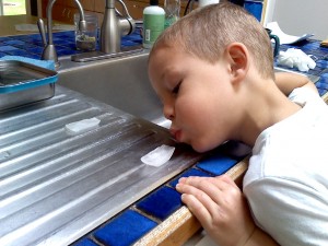 Racing ice cubes. One was melted on the bottom (really scooted) and the other wasn't.